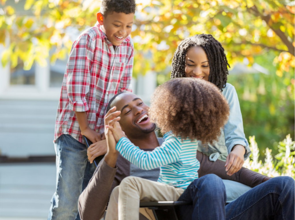 Happy family laugh together outside