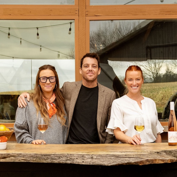 Baker siblings smiling at their winery